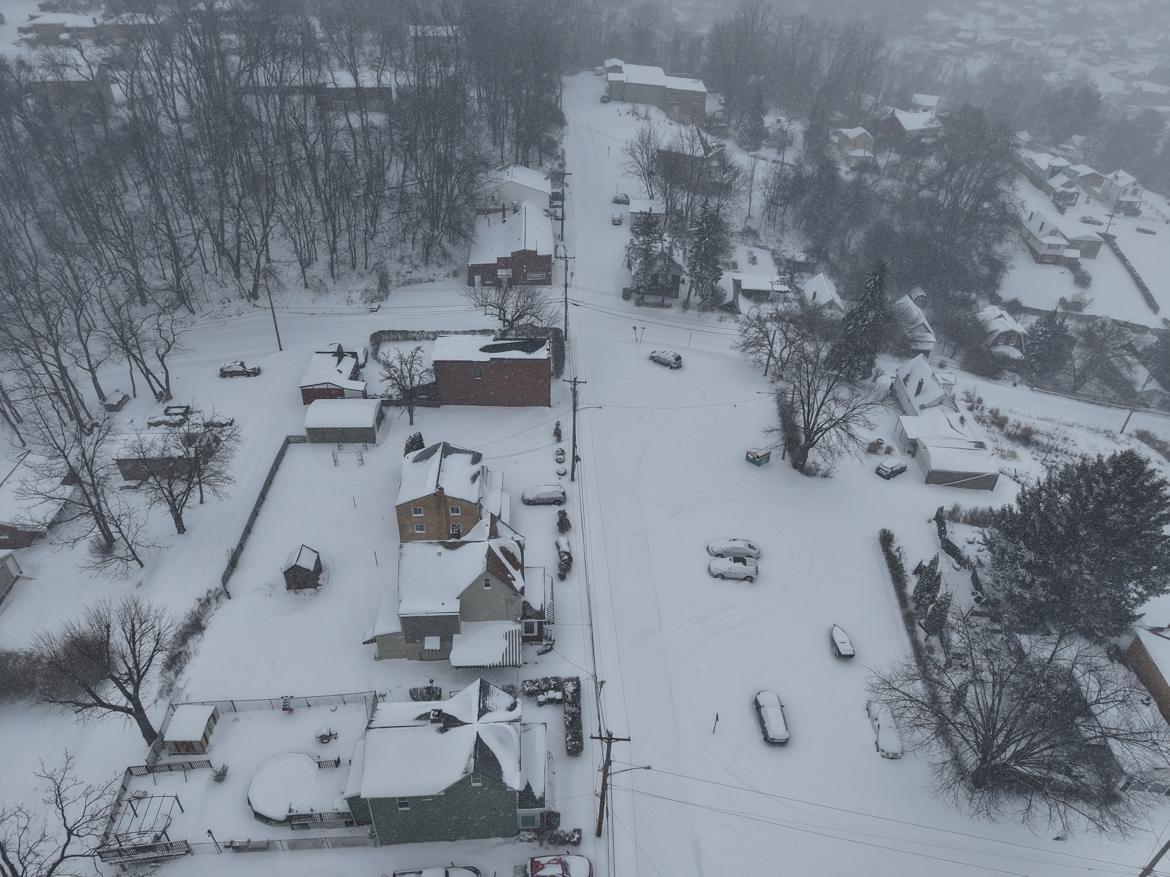 Recent aerial documentation project with clear view of structures and lot orientation